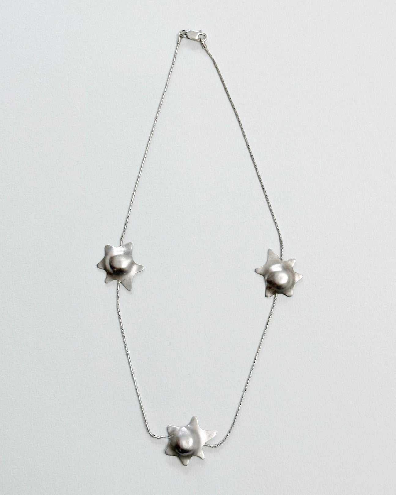 MELTED STARS NECKLACE