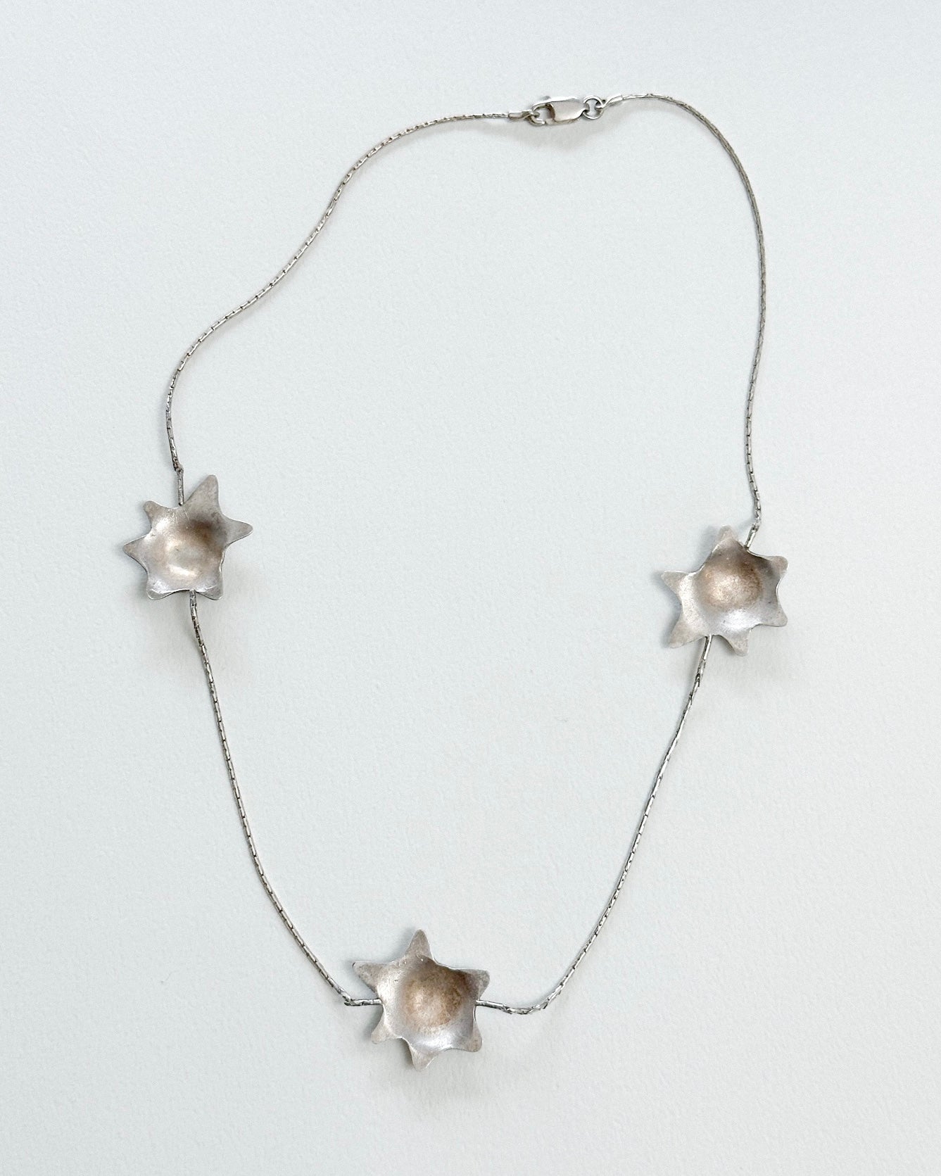 MELTED STARS NECKLACE