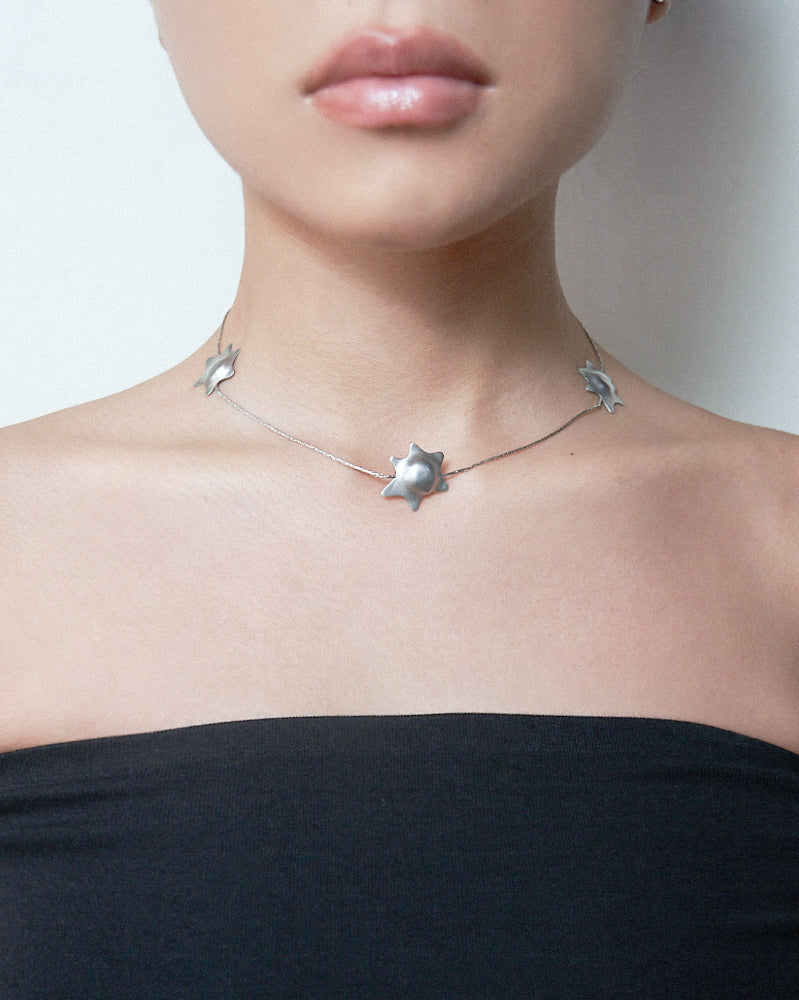 MELTED STARS NECKLACE